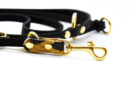 Set aus breitem Fettlederhalsband und komfortabler Leine mit Leomusterbesatz